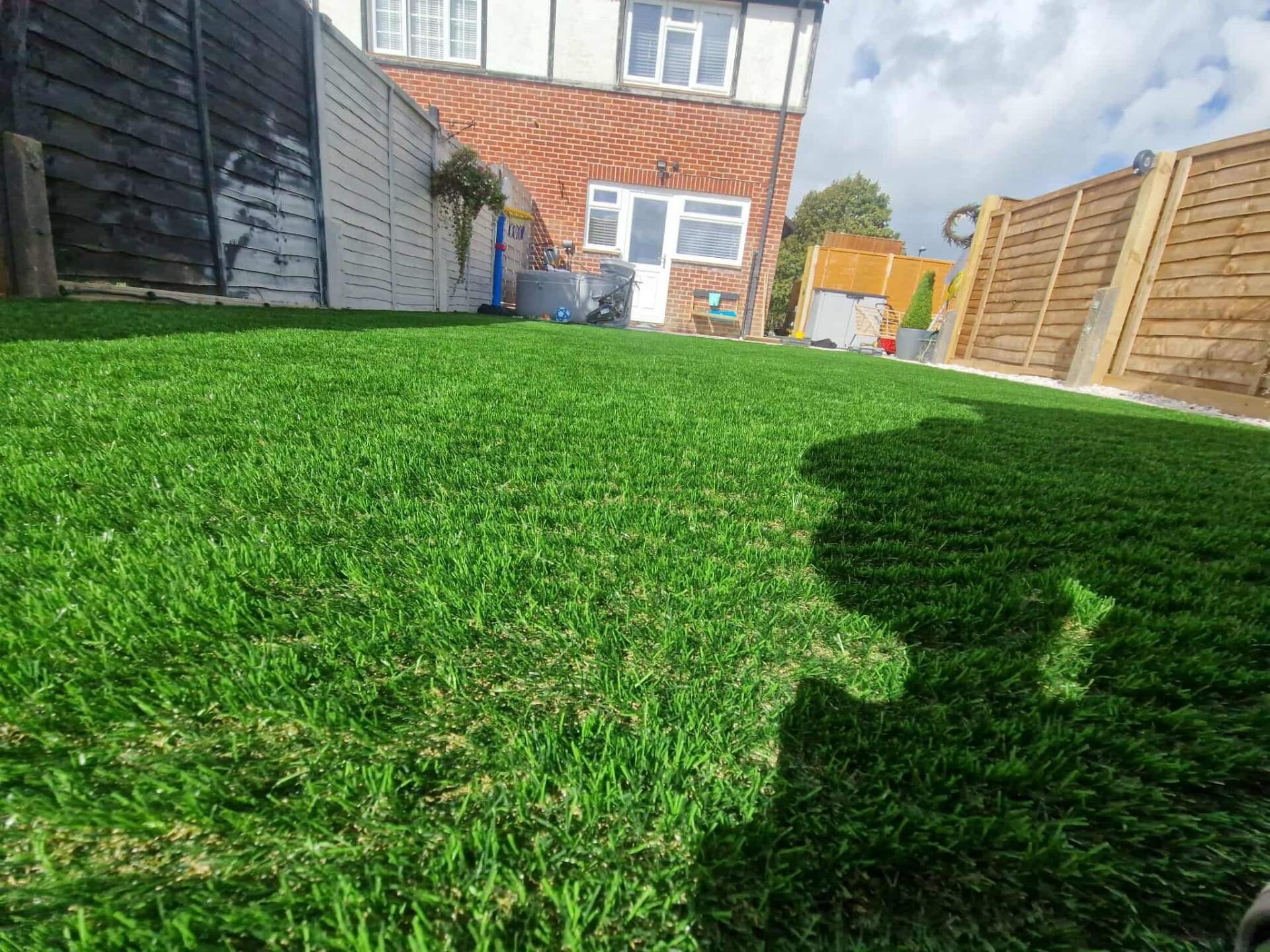 Newly laid lawn at the rear of a Sussex semi-detached home.